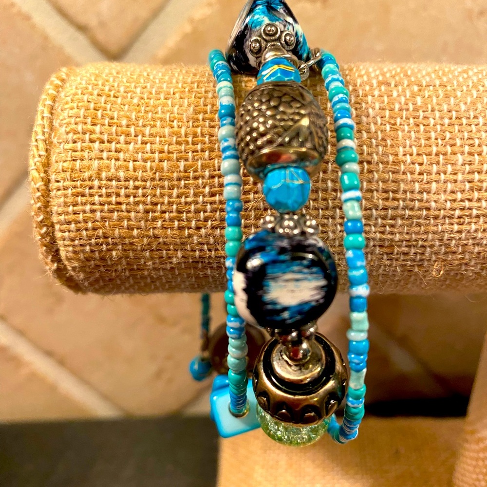 Multi assorted bead coil bracelet.